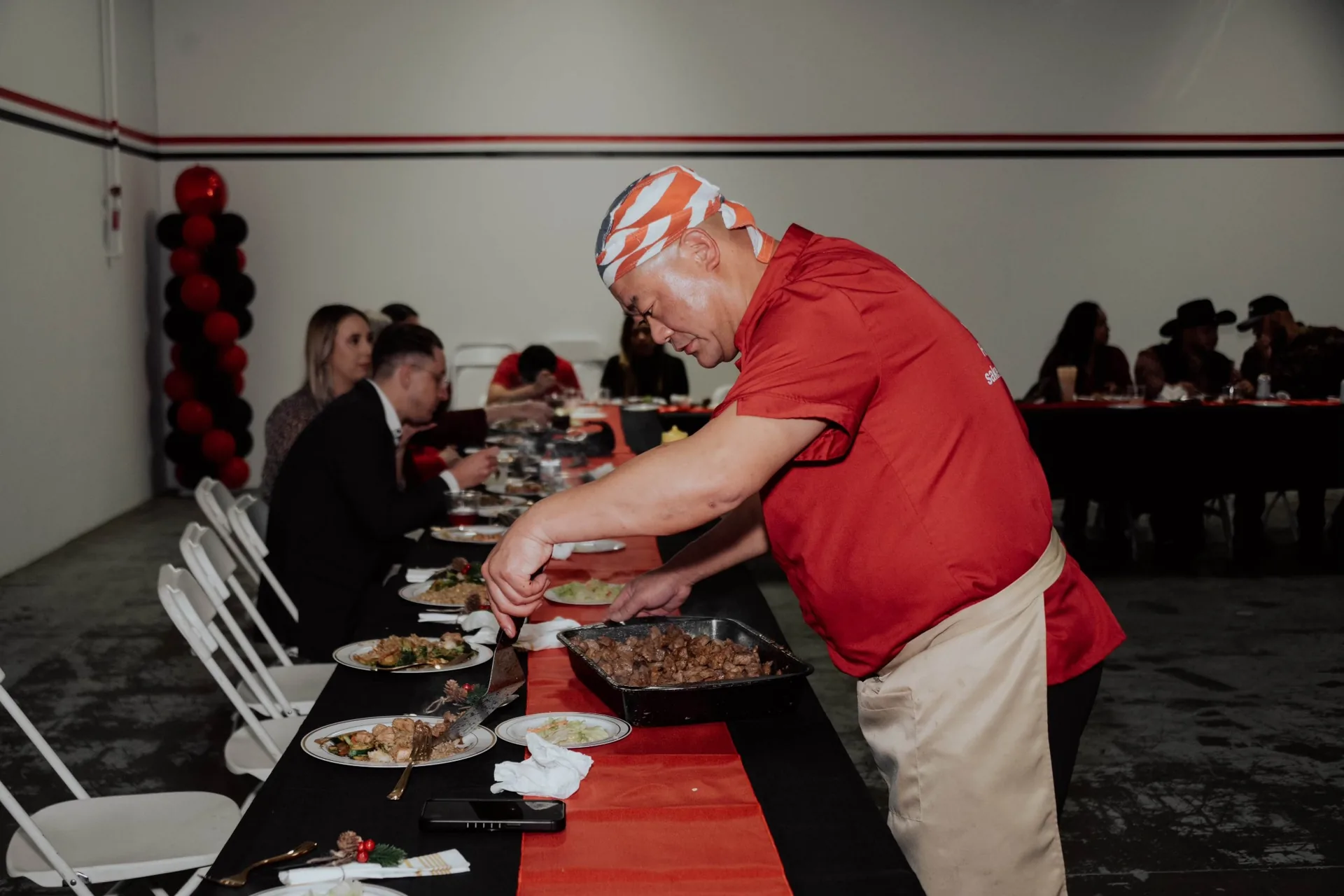 At-home hibachi party with guests in United States
